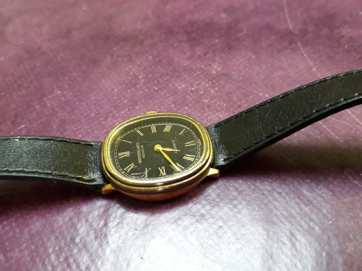 Montre femme ancienne Raymond Weil Genève Quartz en l'état