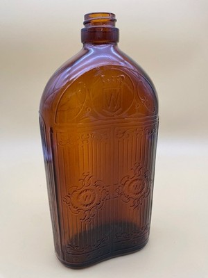 Vintage amber embossed Hiram Walker 25 oz whisky bottle