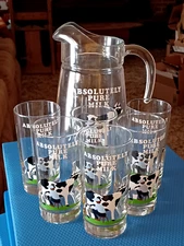 clear pitcher and  6 glasse set,(dairy theme), ABSOLUTLY PURE MILK