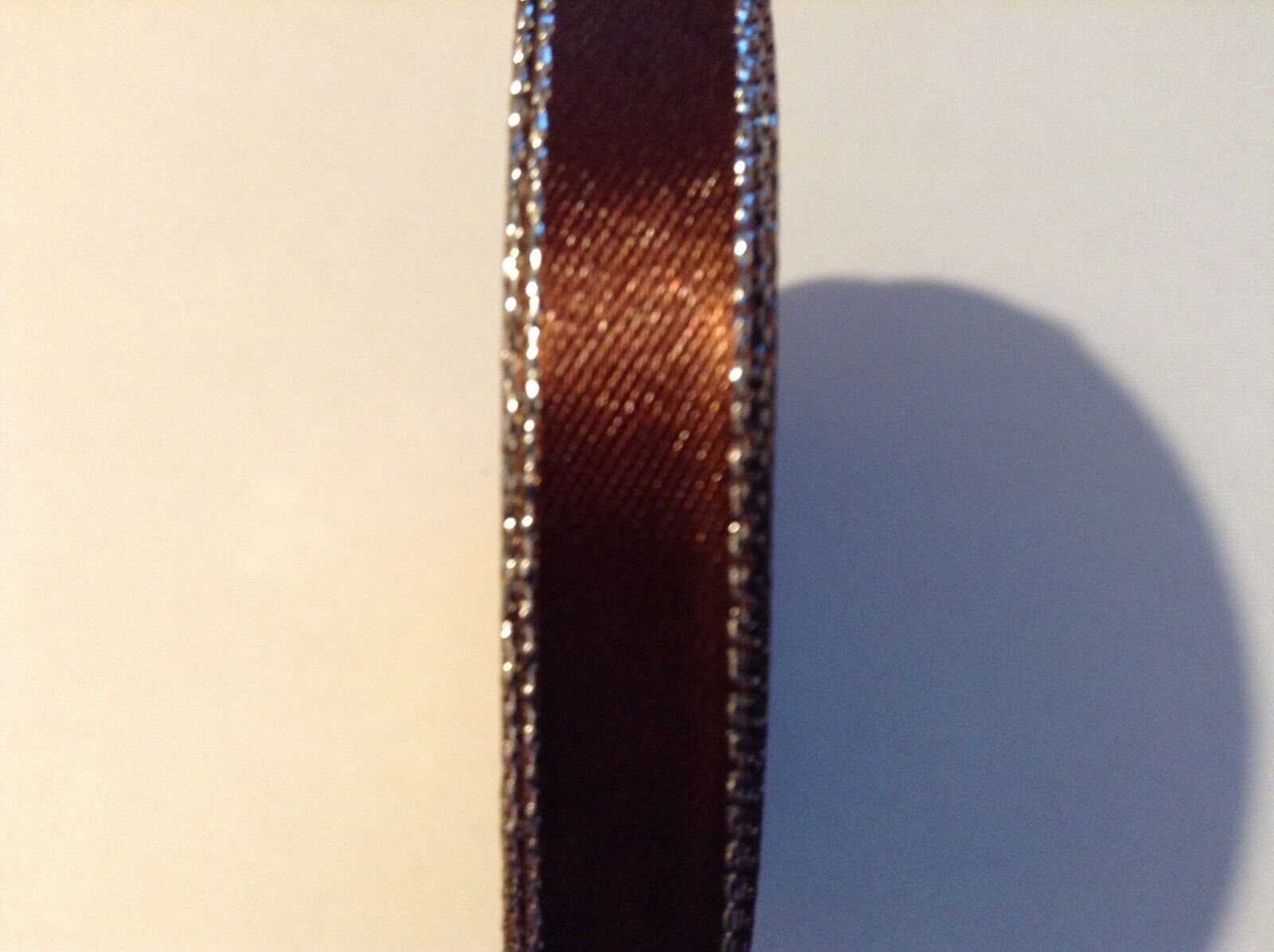 10mm x 2m Brown silver edge double sided polyester satin ribbon.