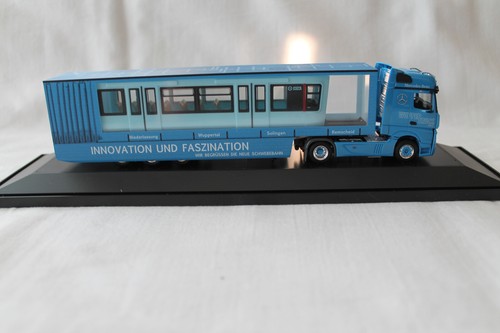 Herpa MB Actros Schwebebahntransport Jahresmodell 2016 Niederlassungen W-SG-RS - Picture 5 of 7