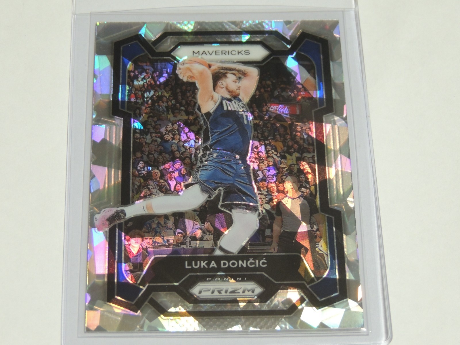 Luka Doncic 2023-24 Panini Prizm #110 Silver Cracked Ice Prizm Dallas Mavericks