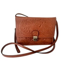 This is a Patricia Nash Locri Tooled Leather Crossbody Bag in Florence brown lea