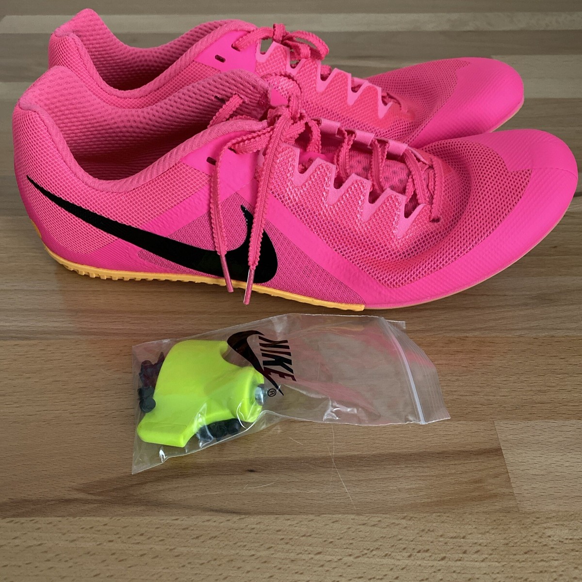 pink track cleats