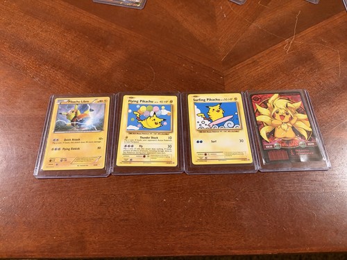 4 rare Pikachu collectibles slightly used. Limited edition collectors edition.