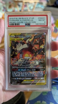 Reshiram & Charizard GX SM201 Black Star Promo PSA 8