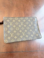Vintage Louis Vuitton Pochette Homme Monogram canvas clutch is M51795.
