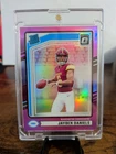2024 Panini Donruss Rated Rookie Jayden Daniels #389 Optic Preview Pink Prizm