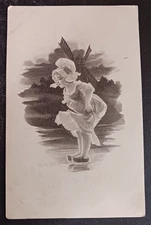 1910 postcard Dutch girl windmill wooden shoes in puddle posted