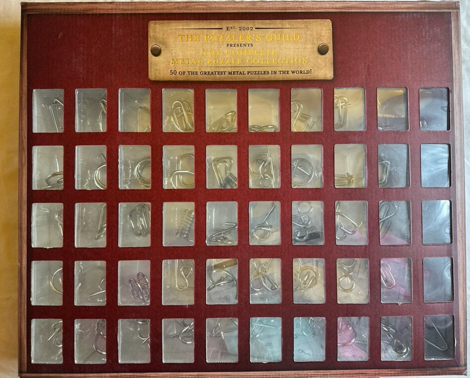 The Puzzler's Guild Complete Metal Puzzle Collection 50 Pc New unopened in box - Image 2 of 4