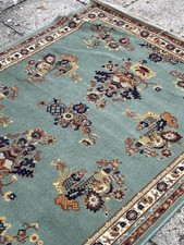 Luxury Sultani Palace rug floral pattern on an aqua field hand-knotted wool