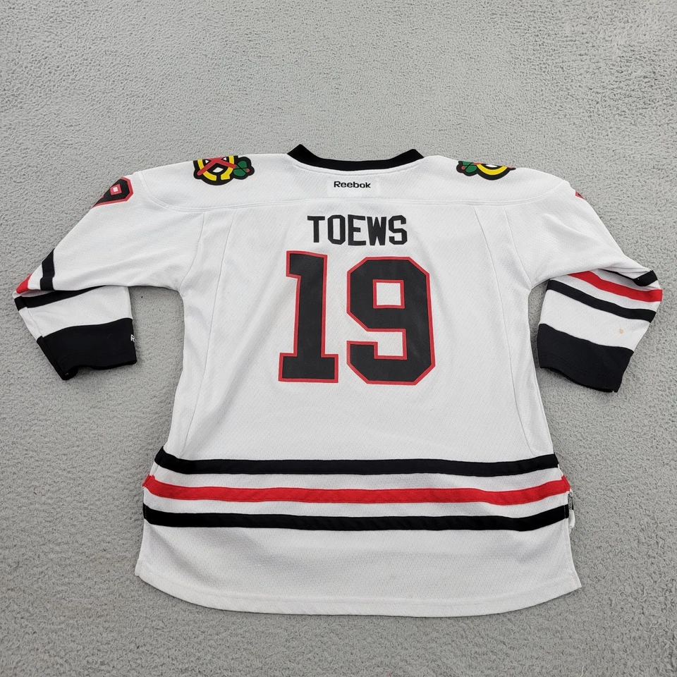 Camiseta deportiva de los Chicago Blackhawks 19 punteras para niños grande/XL Reebok con cuello en V para jóvenes Foto 2 de 4