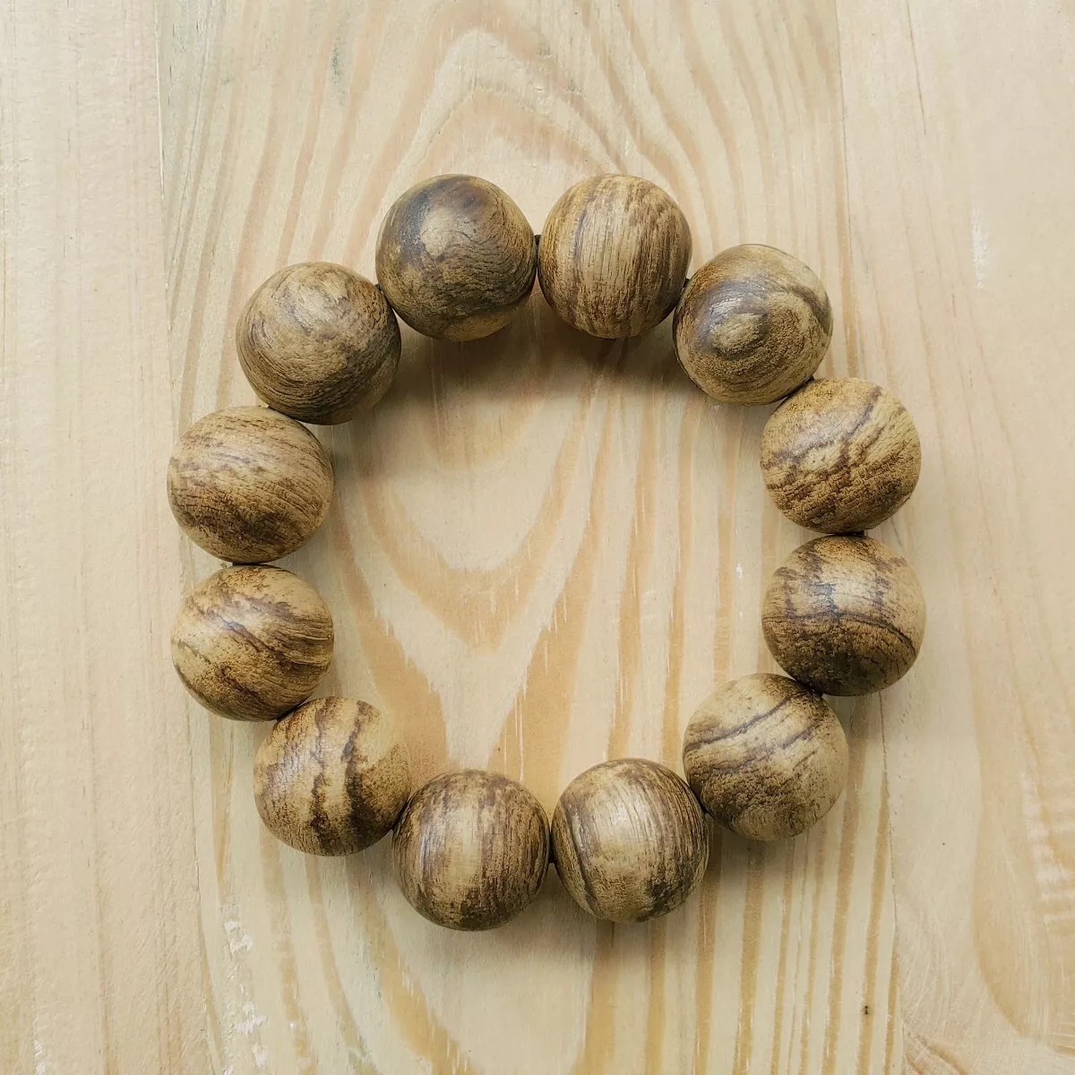Average weight of a cheap beaded bracelet in ounces