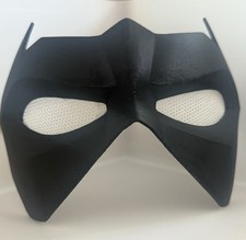 This is a black superhero-style eye mask with a sleek, angular design.