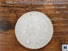 NobleSpirit (JL) 1904 O Morgan Silver Dollar AU About Unc.