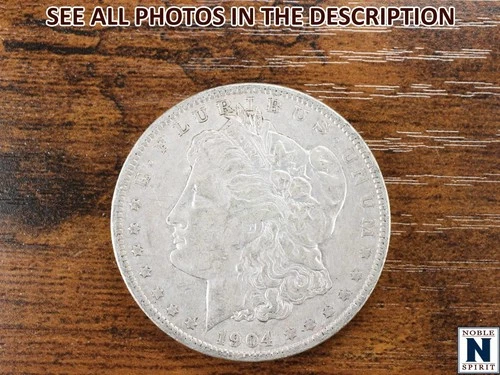 NobleSpirit (JL) 1904 O Morgan Silver Dollar AU About Unc.