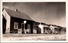 PC2952 Canada PQ Quebec Gaspe Anse a Valleau Cabins Roadside Scene Postcard RPPC