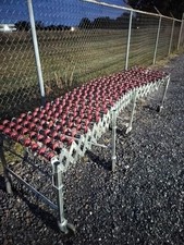 Expandable Skatewheel Conveyor with Red Wheels