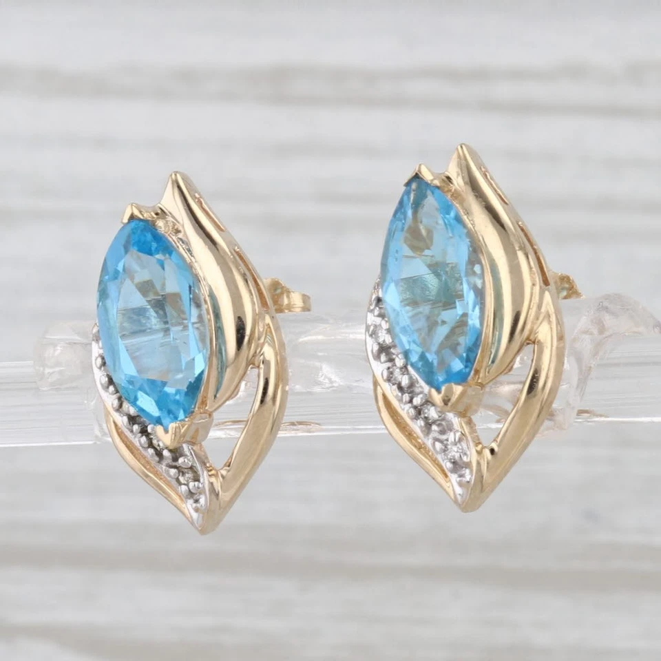 Aretes de diamantes con topacio azul marquesa de 2,54 quilates de oro amarillo de 14 k Foto 2 de 4