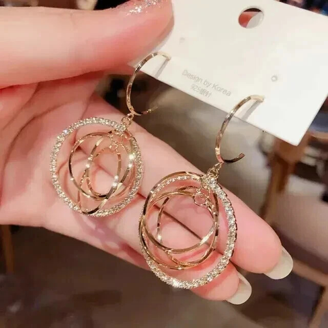 1.50Ct Round Cut Moissanite Dangle Earrings in 14K Yellow Gold Plating