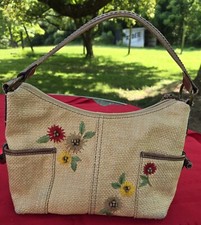 Vintage Fossil Straw Purse with flower and bead accents.