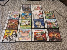 14 Authentic Nintendo Branded EMPTY DS Cases some with manuals .