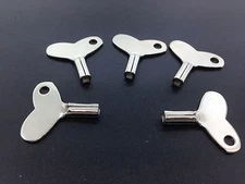 Novelty-Pendulette Clock Key #1 2.6 mm Set of 5  bouncing doll Clocks