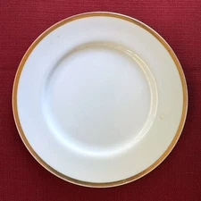 Fine gold-rimmed porcelain private-label salad plates from Gump’s of SF set of 4