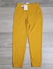 ?Fabletics Sweatpants Unisex Med Eco‑Conscious Slim Jogger Mustard Yellow NWT