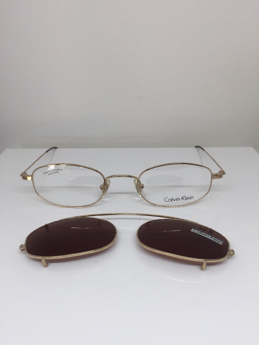 New VINTAGE CALVIN KLEIN Eyeglasses CK 145 Gold With Sun Clip On