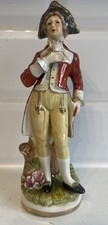 antique German porcelain figurine boy with flower