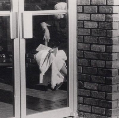 REFLECTION IN GLASS DOOR - GROCERY ENTRYWAY 1977 Gelatin Silver Photograph
