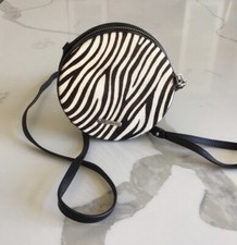 Rebecca Minkoff black Colby circle wristlet $265