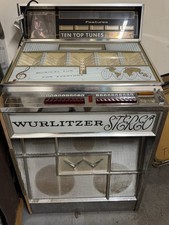 Wurlitzer Stereo Jukebox Machine with Ten Top Tunes Header