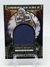 2022 Panini Obsidian Kenneth Walker III Unbreakable /125 RC Rookie UM-KWA 