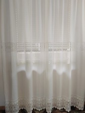 tenda con inserti in macramè