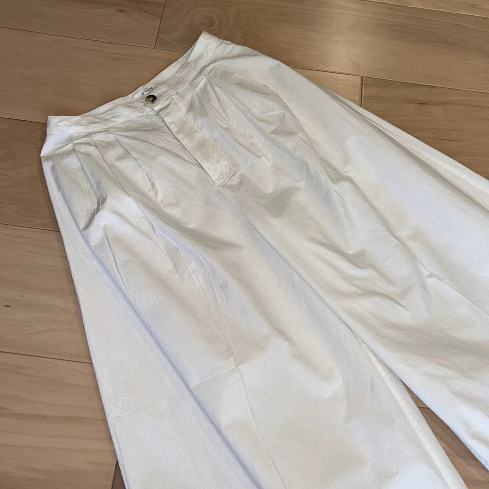 Pantalón plisado corto de pierna ultra ancha de tiro alto de algodón Doen para mujer 25’s Foto 2 de 4