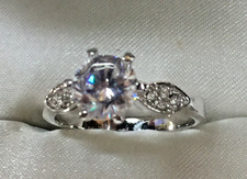 Beautiful Cubic Zirconia Solitaire With Accents Ring Silver Tone Sz 7 and Case 