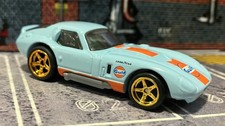 Custom Shelby Cobra Daytona Coupe Gold Real Riders Hot Wheels Gulf Blue Custom Shelby Cobra Daytona Coupe Gold Real Riders Hot Wheels Gulf Blue