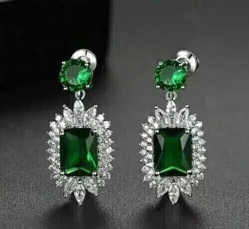 8Ct Emerald Cut Simulated Green Dangle Earrings in 14K White Gold Plated
