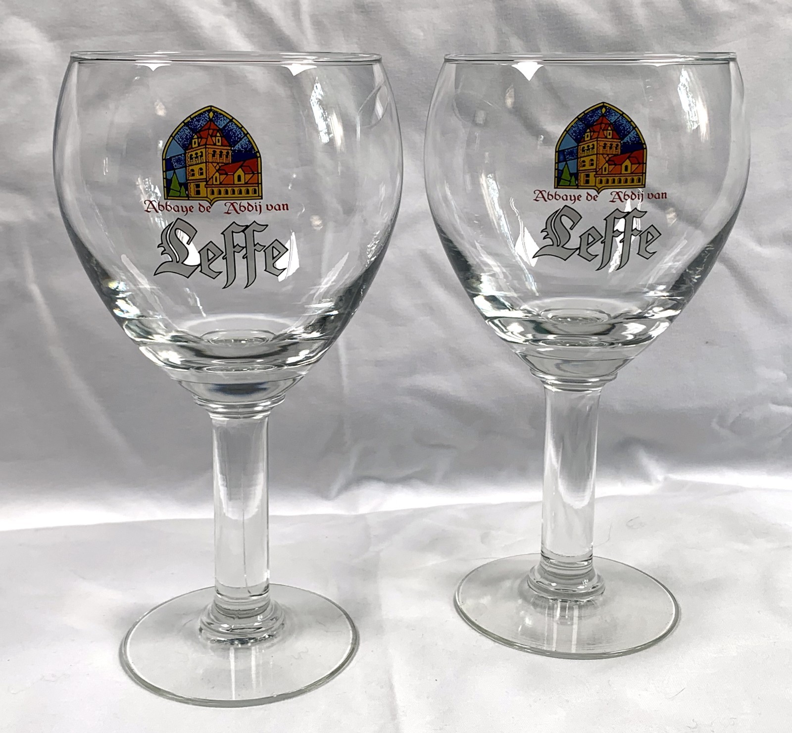 Leffe 16 oz Stemmed Belgium Beer Glasses with Colorful Abbey Logo