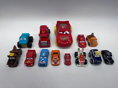 Lot 4 of Disney Pixar Cars and Trucks different sizes and types