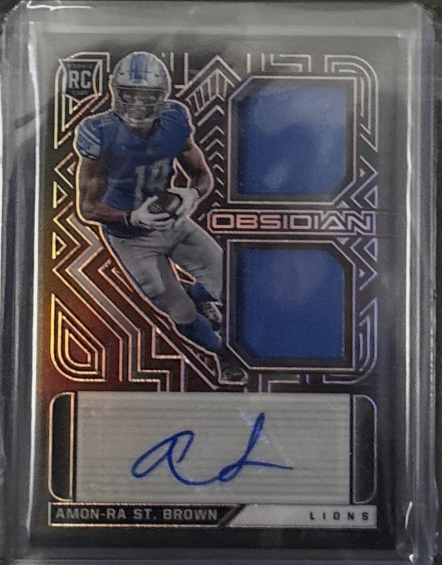 2021 Panini Obsidian Jersey Relic - Amon-Ra St Brown Rookie Auto RC RPA /150