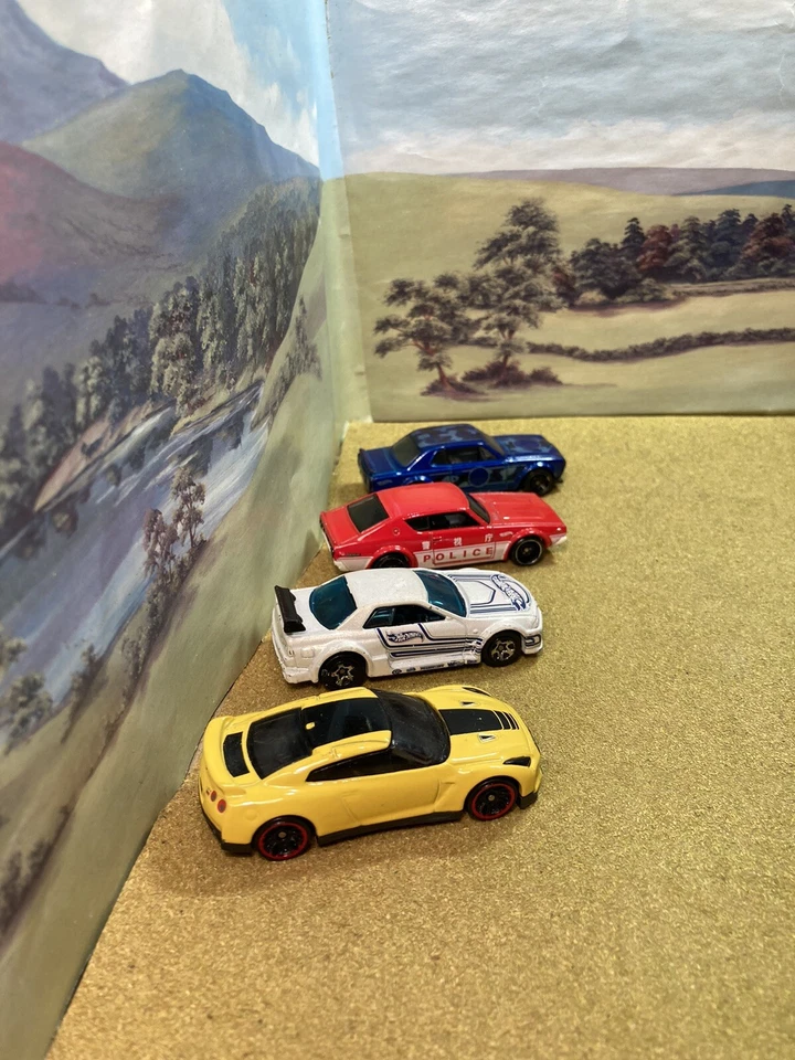 Paquete Hot Wheels x 4 Nissan Skyline GT-R R34 R35 2000 GT en buen estado Foto 2 de 4