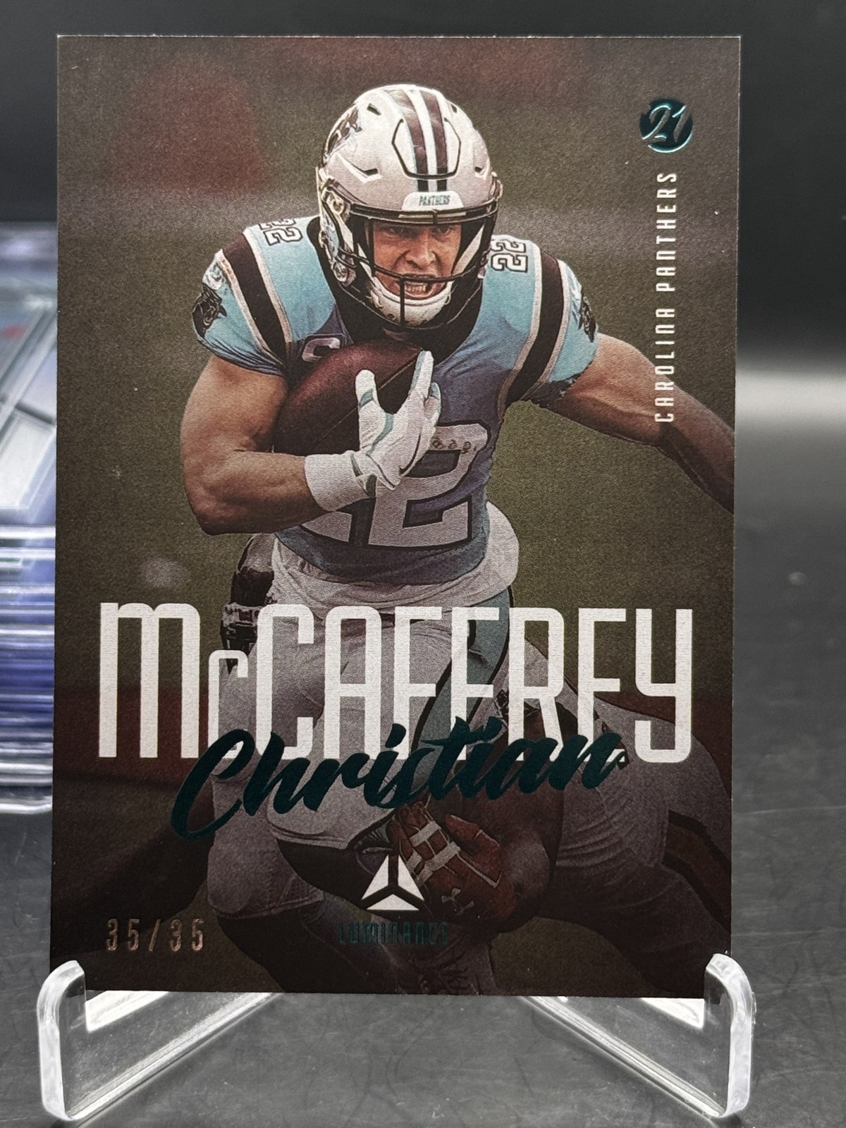 Christian McCaffrey 2021 Panini Luminance #14 Teal #35 Panthers & 49ers
