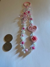 Handmade beaded pink keychain decor for bags, backpacks, and more
