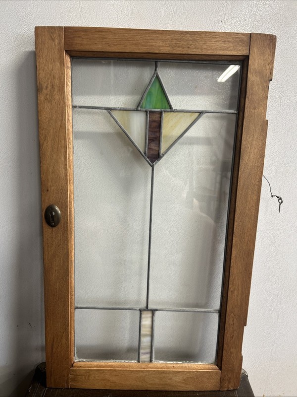 stained glass panel 27” x 16”.  Clear / Green, Beige & Brown Stained Glass
