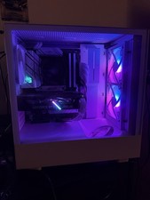 Gaming PC Setup Includes Monitor, Power Supply, and Accessories