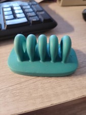 Quirky turquoise 4 slot desktop cord organizer