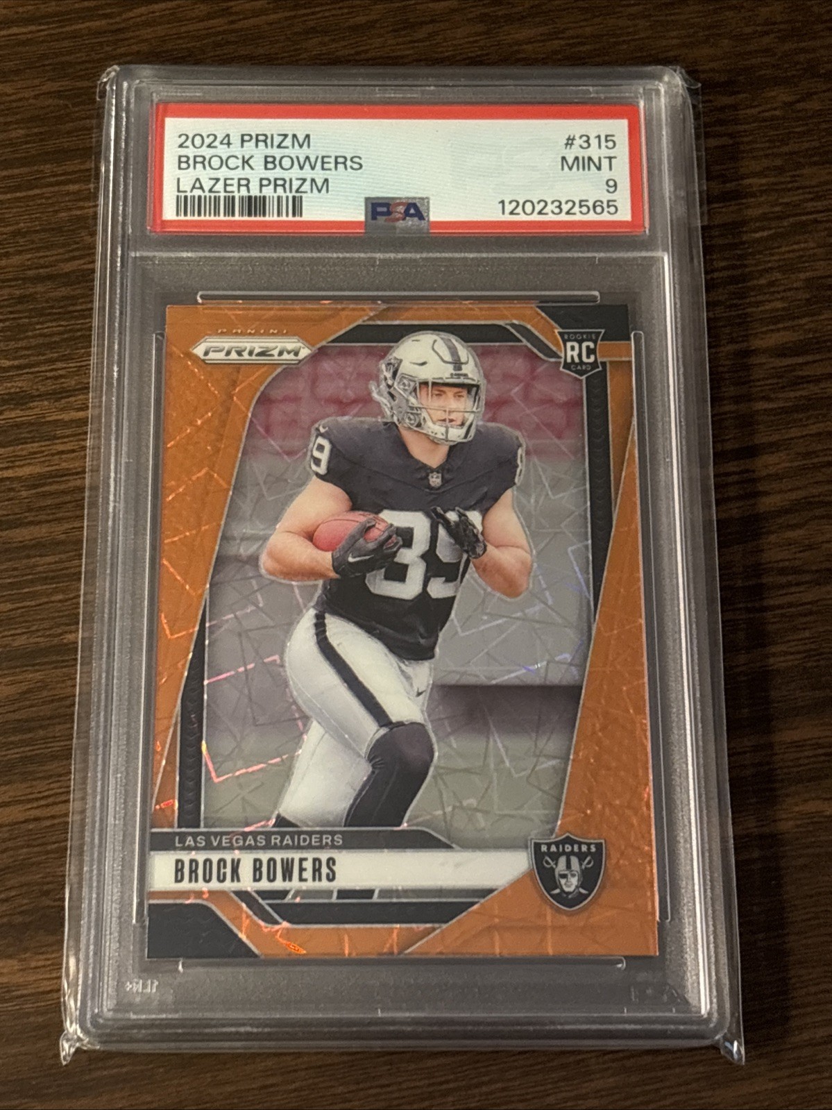 2024 Panini Prizm Brock Bowers #315 Orange Lazer PRIZM PSA 9 Mint Raiders